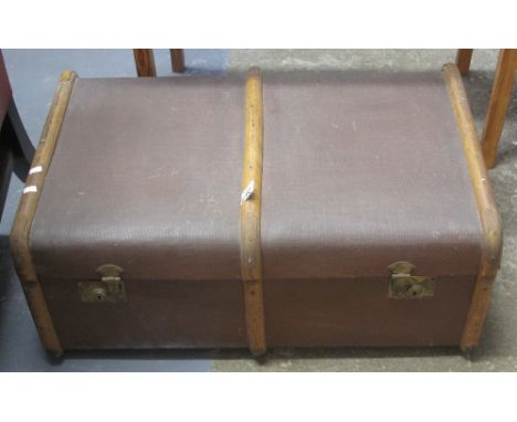 Vintage canvas and wooden banded trunk.(B.P. 24% incl. VAT)
