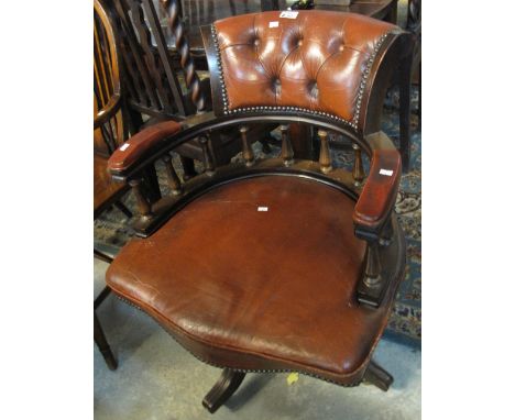 20th Century mahogany and leather button back office swivel armchair. (B.P. 24% incl. VAT)
