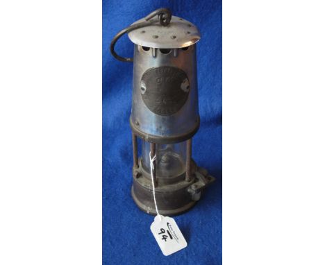 Protector Lamp and Lighting Company Ltd of Eccles original brass miner's safety lamp, used. (B.P. 24% incl. VAT)