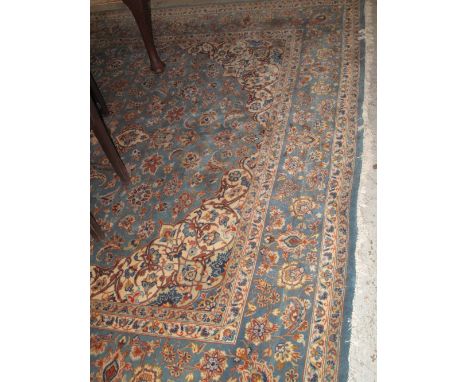 Large Persian design turquoise ground floral carpet.(B.P. 24% incl. VAT)   CONDITION REPORT:  "Turkish".  Good quality lookin