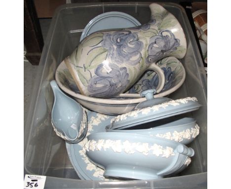 Plastic box containing various Wedgwood blue and white items including: tureens; gravy boat; oval meat dishes, together with 