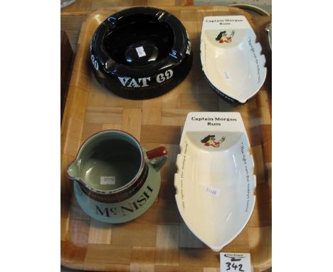 Pair of Wade ceramic Captain Morgan Rum rowing boat ashtrays, together with Dudson Brothers McNish Dr. Special Whisky water j