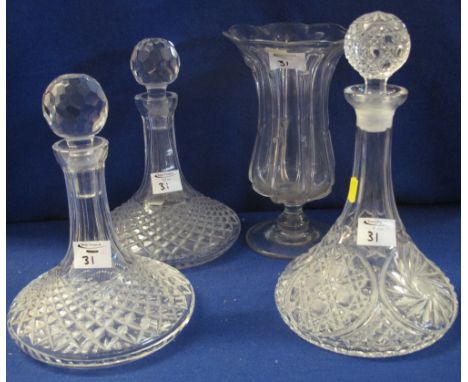 Pair of cut lead crystal glass ship's type decanters with hobnail bands and facet stoppers, 24cm high, another moulded glass 