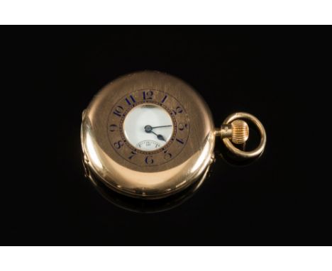 Sir John Bennett, an 18ct gold keyless half-hunter pocket watch: the white enamel dial having black Arabic numerals, a subsid