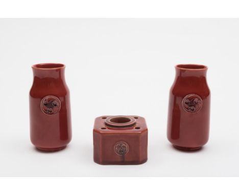 A Moorcroft pottery for Liberty & Co. part desk set: in the Flamminiam pattern, comprising an inkwell and pair of small vases
