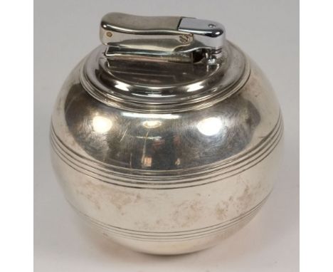 An Elizabeth II  silver 'Witchball' table lighter, maker RC, London, 1965: retailed by Comyns, London, 7.5cm. diameter.


