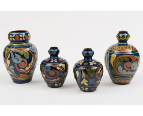 Four Aller Vale (Torquay) pottery vases: each decorated in the 'D1' pattern, comprising a pair of small vases and one larger,