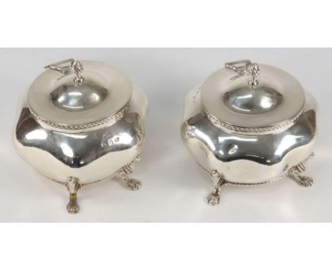 A  late Victorian silver tea caddy, maker A & B, Birmingham 1898: of lobed circular form, with shallow domed hinged lid, rais