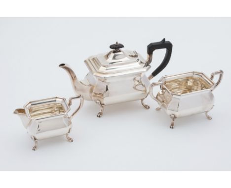 A George V  silver three-piece tea service, maker Charles Boyton & Son, Sheffield, 1929: of rectangular barge shaped outline 