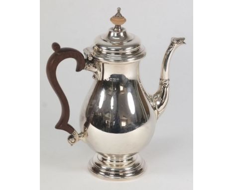 An Elizabeth II silver coffee pot, maker Adie Brothers Ltd, Birmingham, 1962: initialled, in the Georgian style, of plain bal
