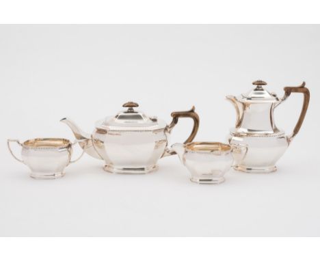 An Elizabeth II silver four-piece tea service, maker CB & S, Sheffield, 1965: of barge shaped outline with beaded border and 