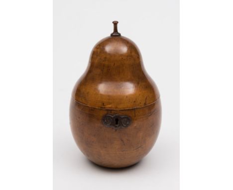 A 19th century  fruitwood pear-shaped tea caddy: the hinged lid enclosing a zinc foil lined interior 17cm. high.