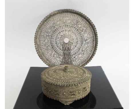 A FINE ANTIQUE SILVER FILIGREE CIRCUALR BOX AND COVER, on a matching circular tray probably Indian or ottoman late 19th centu