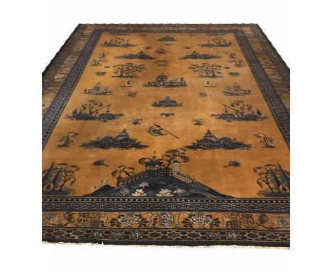 CHINESE CARPET, 366cm x 277cm, of repeating architectural and arborial motifs on famille jaune field.