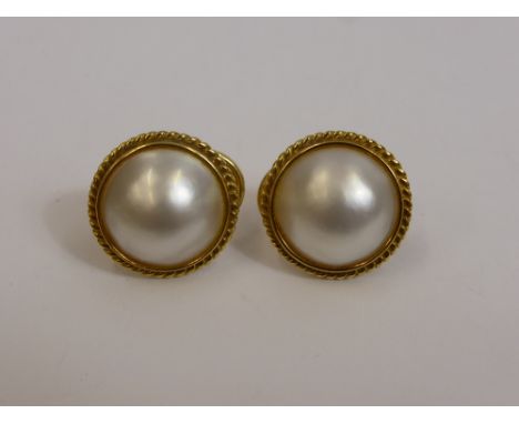 A Pair of 18 ct Yellow Gold Mabe Pearl Earrings. The pearls are approx 14 x 14 mm, approx wt 10.2 gms.