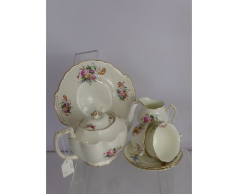 A Part Coalport "Junetime" Tea Set, comprising tea pot, milk jug, sugar bowl, five tea cups, six saucers, six tea plates, one