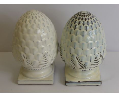 A Pair of Decorative Ceramic Mantel Cones, together with a plaster cast of Clytes and a carved wooden sculpture approx 56 cms