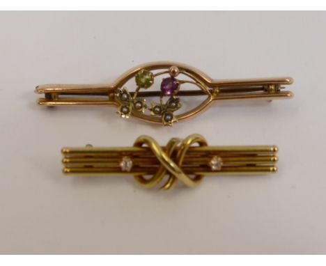 Two Edwardian Gold Bar Brooches, one 15 ct yellow gold and diamond knot brooch, the other 9 ct green pink stone and seed pear