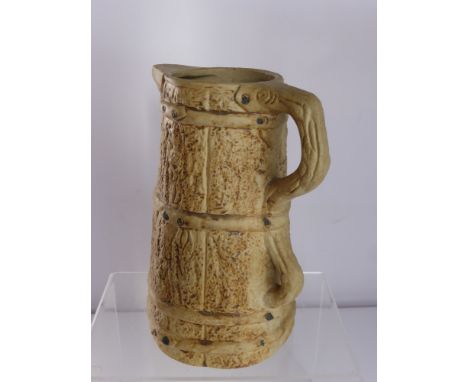 A Large Stoneware Water Pitcher, together with a Staffordshire Ironstone cheese dish and cover.