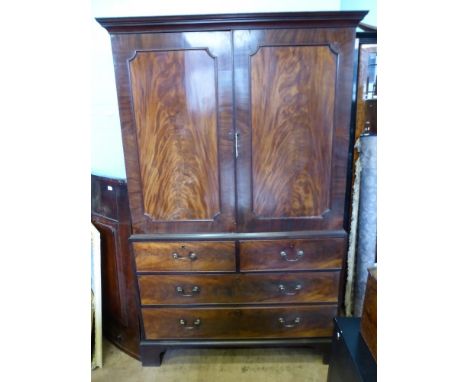 A Victorian Linen Press, five linen slides, two short and two long drawers with brass swan neck handles, on bracket feet, app