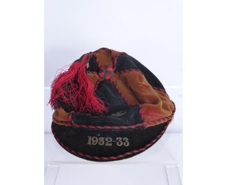 A Vintage Cheltenham Boys School Velvet Cricketing Cap, the cap embroidered with the dates 1932-1933 together with a swagger 