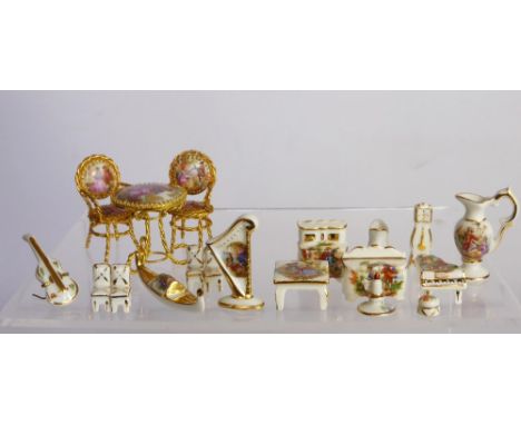 A Quantity of Limoges Miniature Ornaments, including tea set, hall clock, furniture together with three contemporary Moorcrof