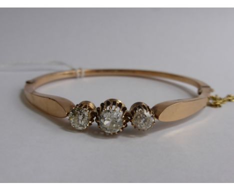 A Lady's Rose Gold Three Stone Old Cut Diamond Bangle Bracelet, old cut dias 1 x 1 ct  and 2 x 80 pts old cut, approx 11.9 gm