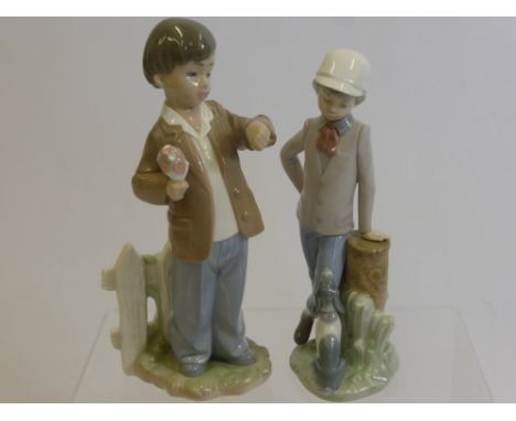 Two Nao Figures of Boys, one with flowers and the other with a dog, approx 26 and 23 cms high.