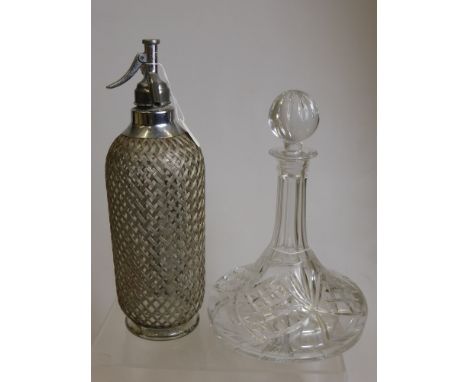 A Vintage Soda Syphon with Silver Metal Overlay, together with a glass ship's decanter. (2)