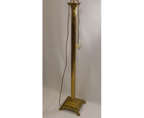 A Brass Column Standard Lamp, with cream shade.