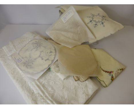 A Quantity of  Vintage Lace and Embroidered Linen, including table cloths, tray cloths and napkins.