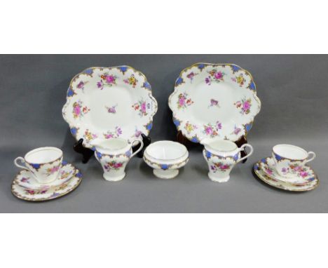 Aynsley bone china floral patterned teaset comprising ten cups, ten saucers, twelve side plates, two cake plates, two milk ju