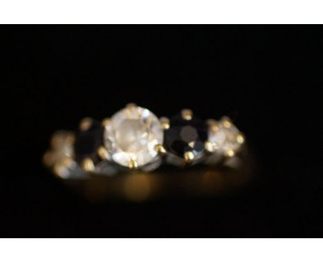 9ct gold ring set with sapphire &amp; clear stones Size K