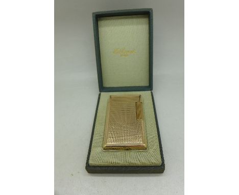 A gold plated S.T. Dupont lighter, boxed