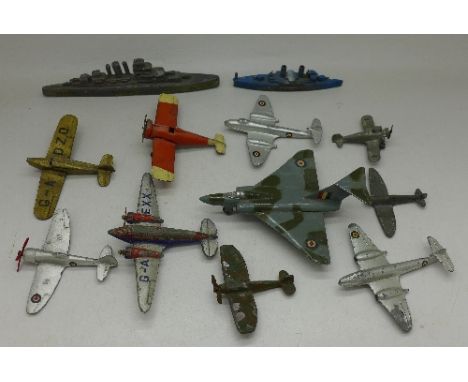 Ten Dinky aeroplanes and two ships
