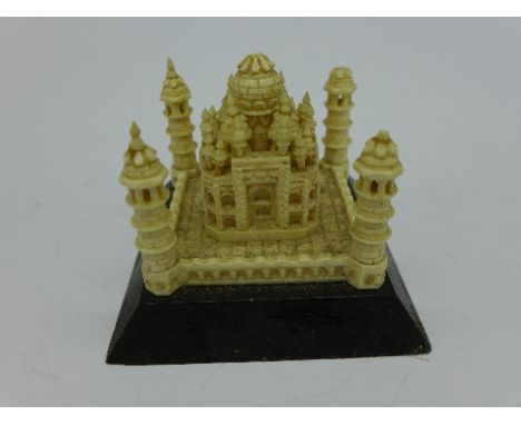 A carved ivory temple, a/f, base 67mm x 67mm