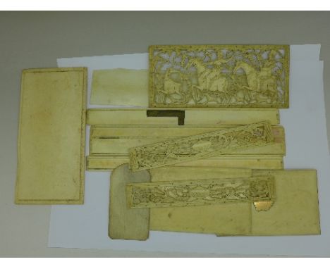 Three carved bone panels and ivory for repairs