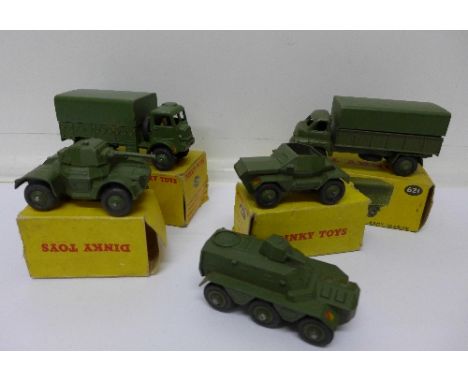 Five Dinky Toys military vehicles; including 623 Army Covered Wagon and 621 3-Ton Army Wagon