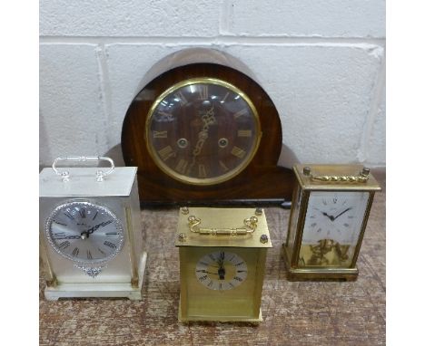 A Smith Enfield walnut cased mantel clock, a Schatz 8-day carriage clock and two others