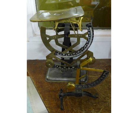 Two sets of scales, one lacking tray