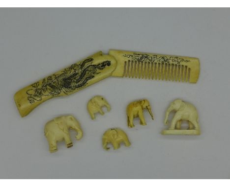 A carved bone comb, an ivory elephant and four other elephants