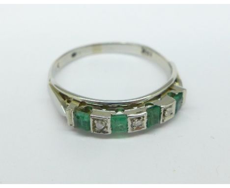 An 18ct white gold, emerald and diamond ring, 3.2g, R