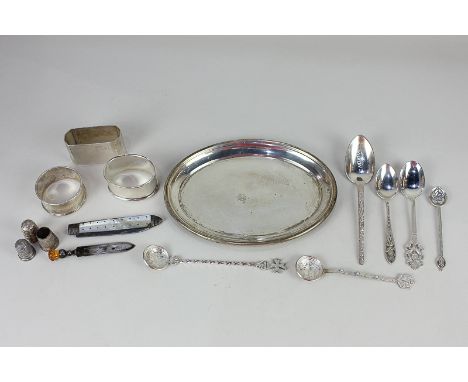 A German white metal oval trinket dish marks worn, a Th. Marthinsen Norwegian silver spoon, two sterling spoons, an 875 white