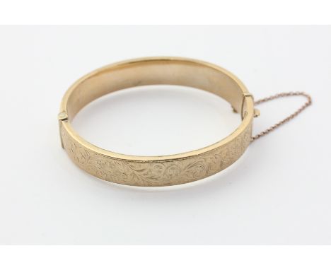 A 9ct gold bangle, 13.5g