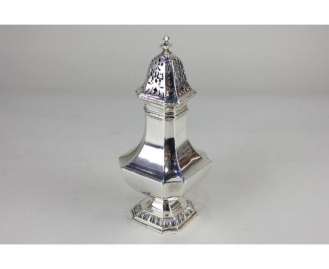 An Edward VII silver sugar castor, faceted baluster shape with slide off top and finial, maker Elkington and Co. London 1909,