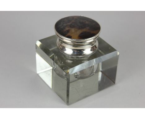 An Edward VII silver mounted square glass inkwell with circular tortoiseshell lid, maker Adie Brothers, Birmingham 1902, 9cm