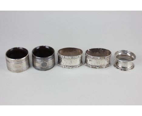 A pair of George V silver mounted napkin rings, engine turned decoration with composite lining, Birmingham 1936, a pair of mo