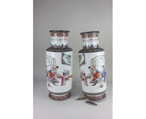 A pair of Chinese porcelain vases, depicting an interior scene of a family welcoming a sage, with character and seal marks, w