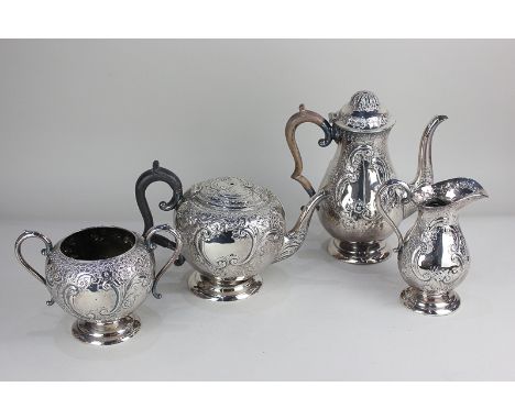 A Victorian silver four piece tea and coffee set, to include teapot, coffee pot, sugar bowl, and cream jug, baluster shape wi