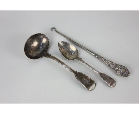 A George IV silver fiddle pattern ladle, with engraved armorial, London 1825, a William  IV silver teaspoon and an Edwardian 